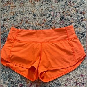 Lululemon bright orange speed up shorts!!